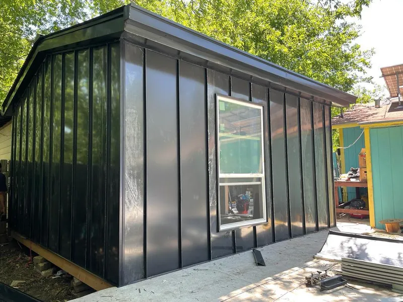 Black standing seam metal wall panels for Metal Roof Installation in Fort Oglethorpe